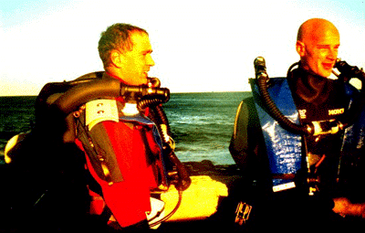Two divers wearing rebreathers